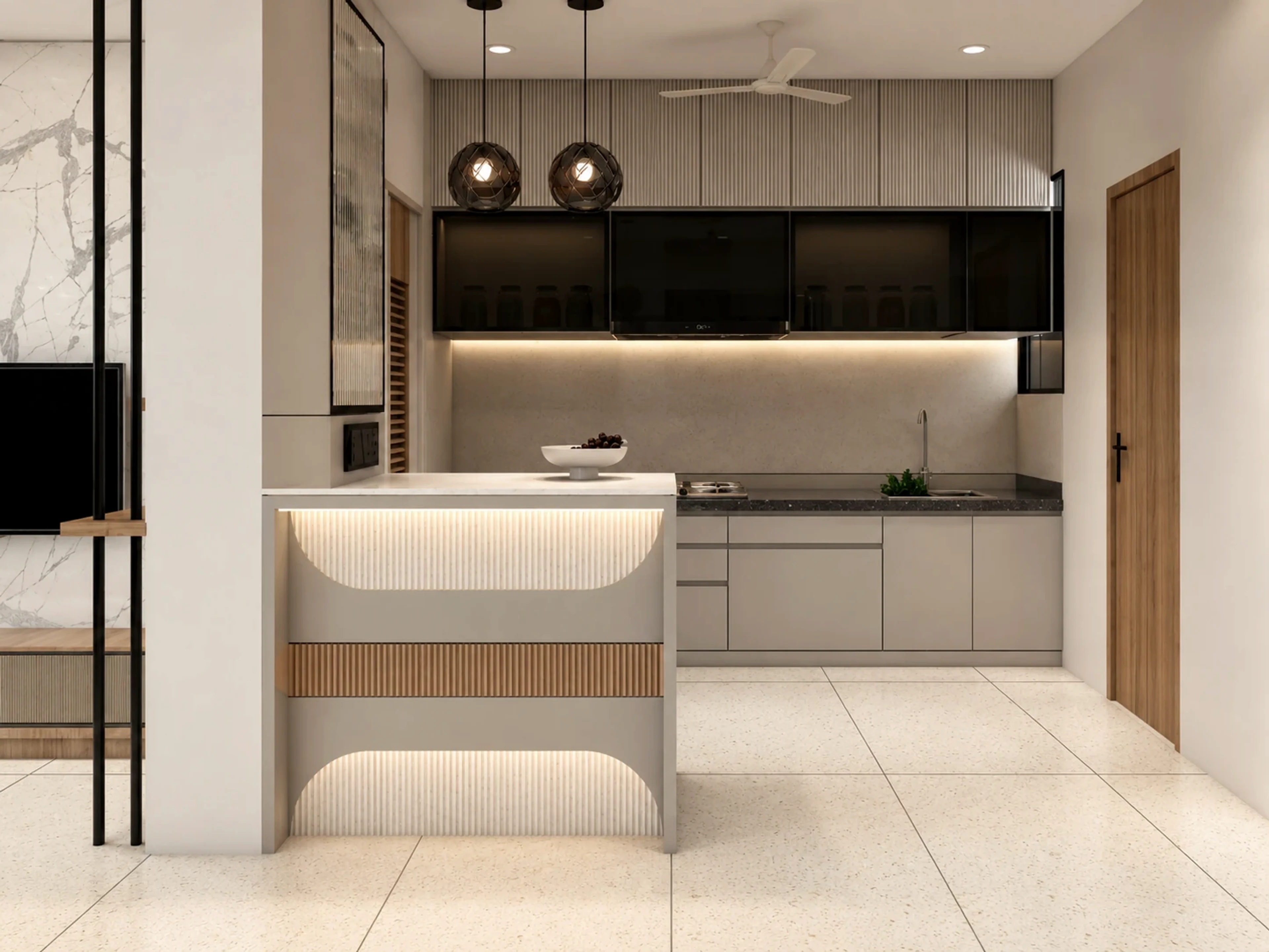 Veda residence kitchen with a fluted island, dark upper cabinetry, and layered warm lighting